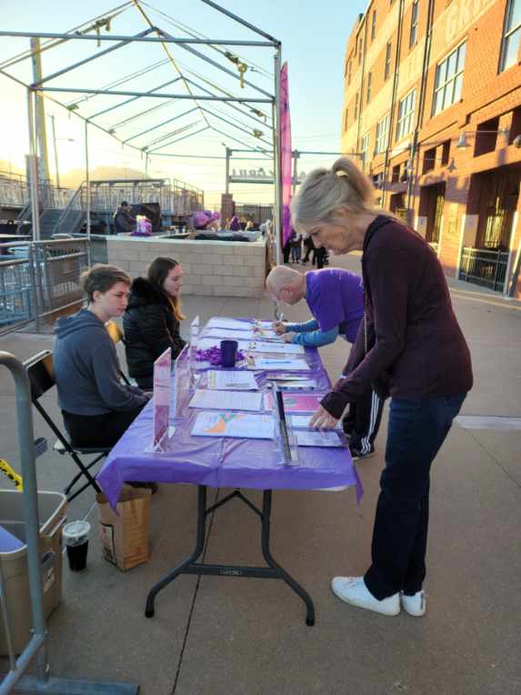 The team helping with registration at the event