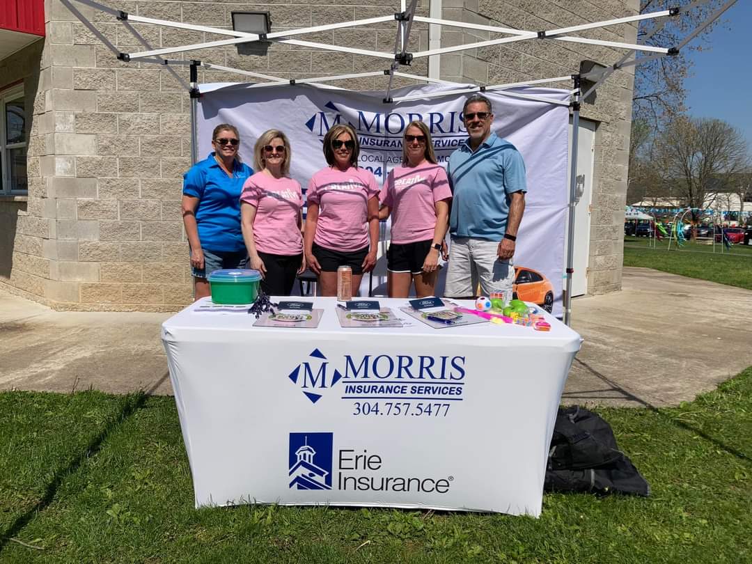 The Morris team is all smiles at the Family Fun event